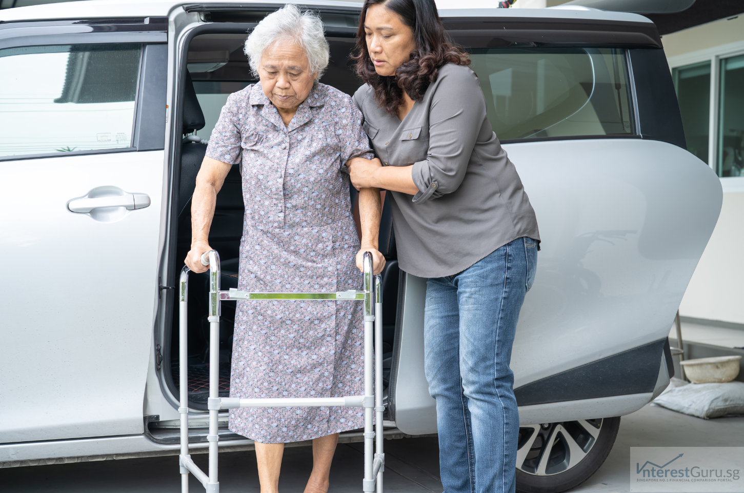Compassionate caregiver supporting an elderly patient with long-term care needs