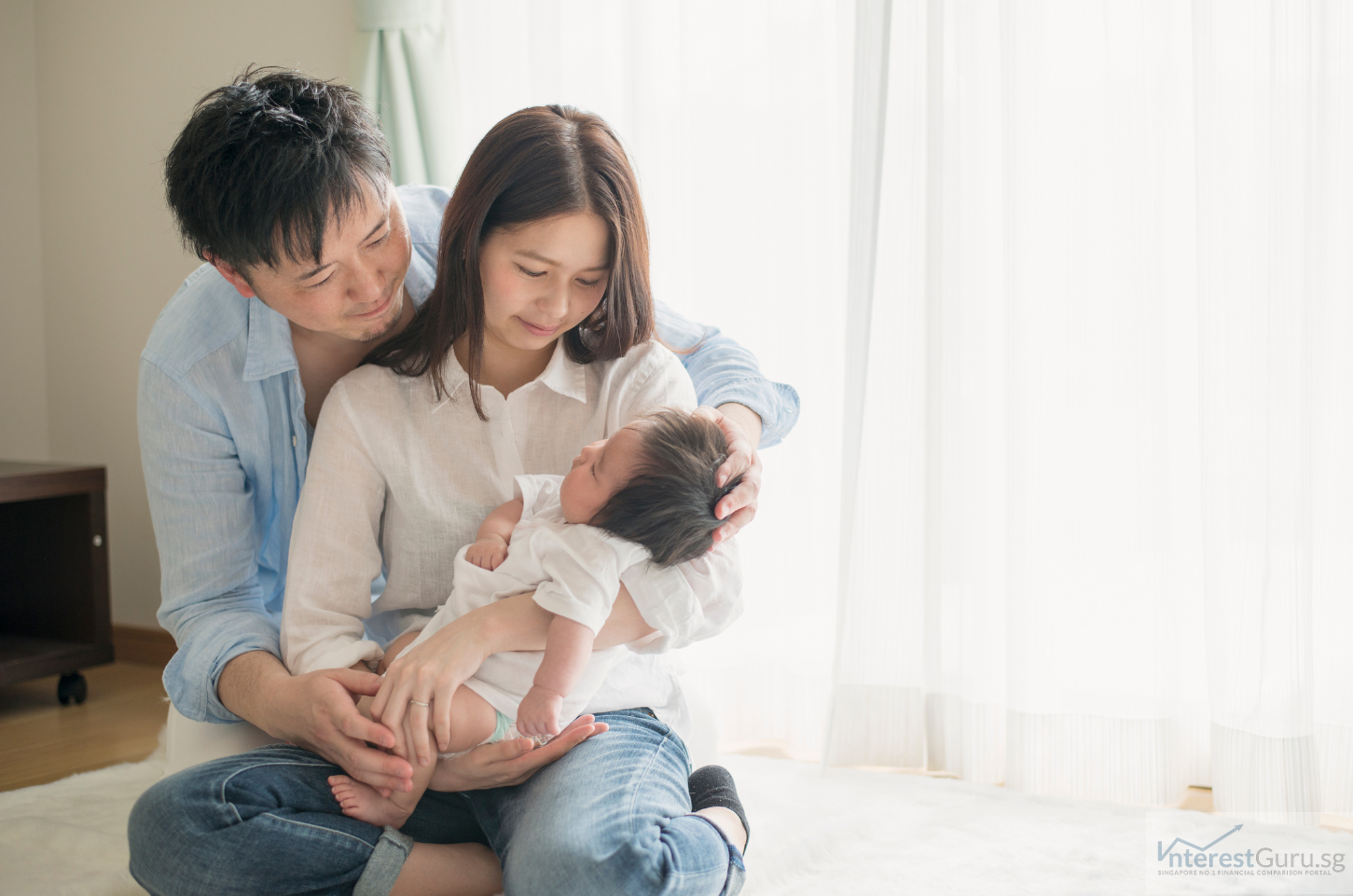 Happy family with newborn